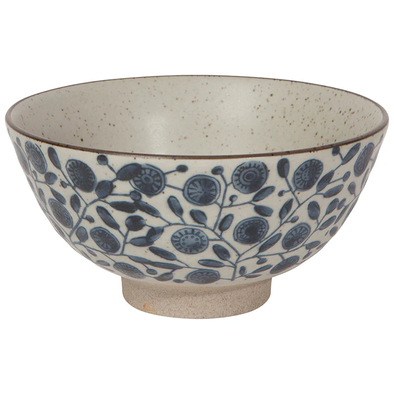 Ceramic bowl with blue floral pattern on a white background