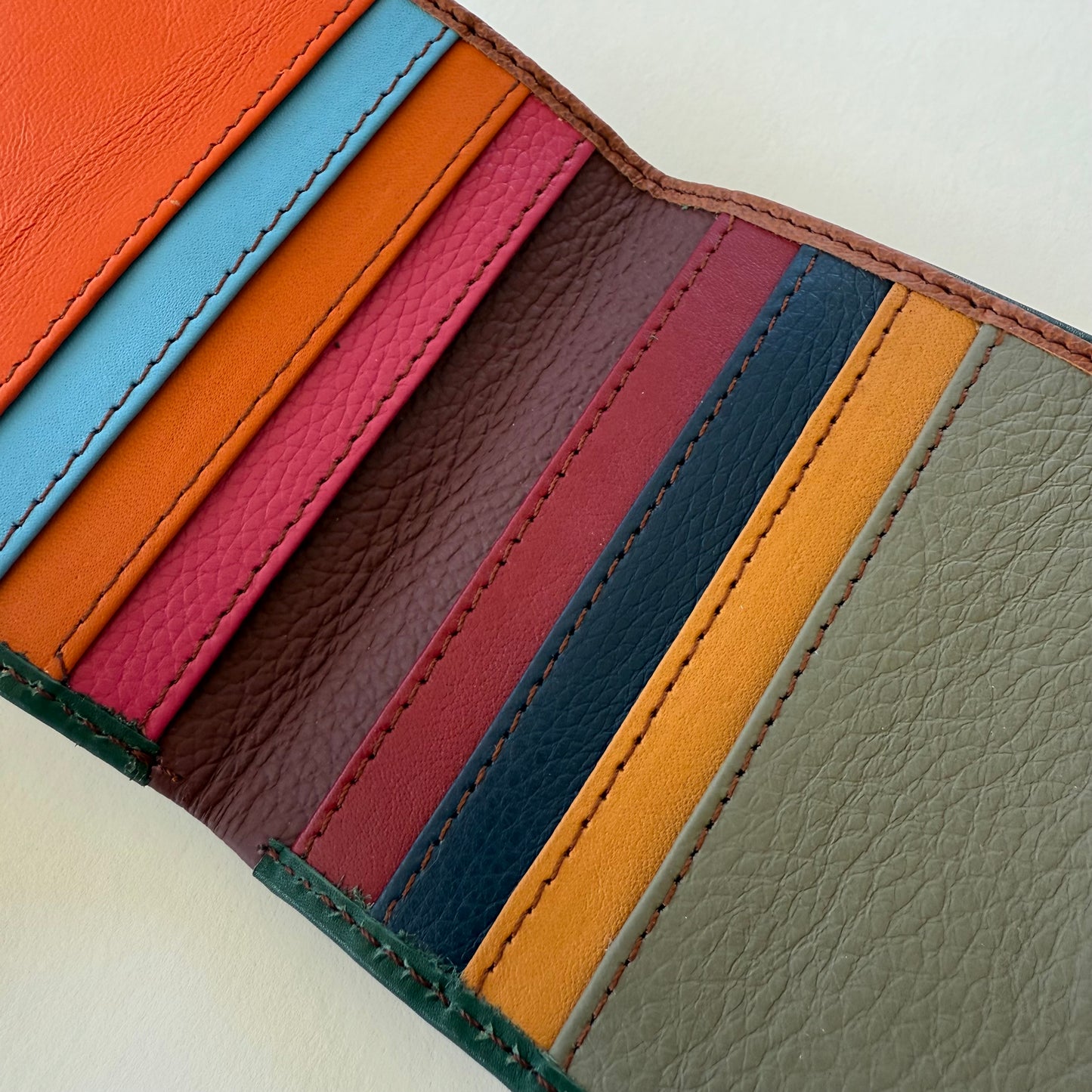 close-up of colorful card slots in interior of wallet