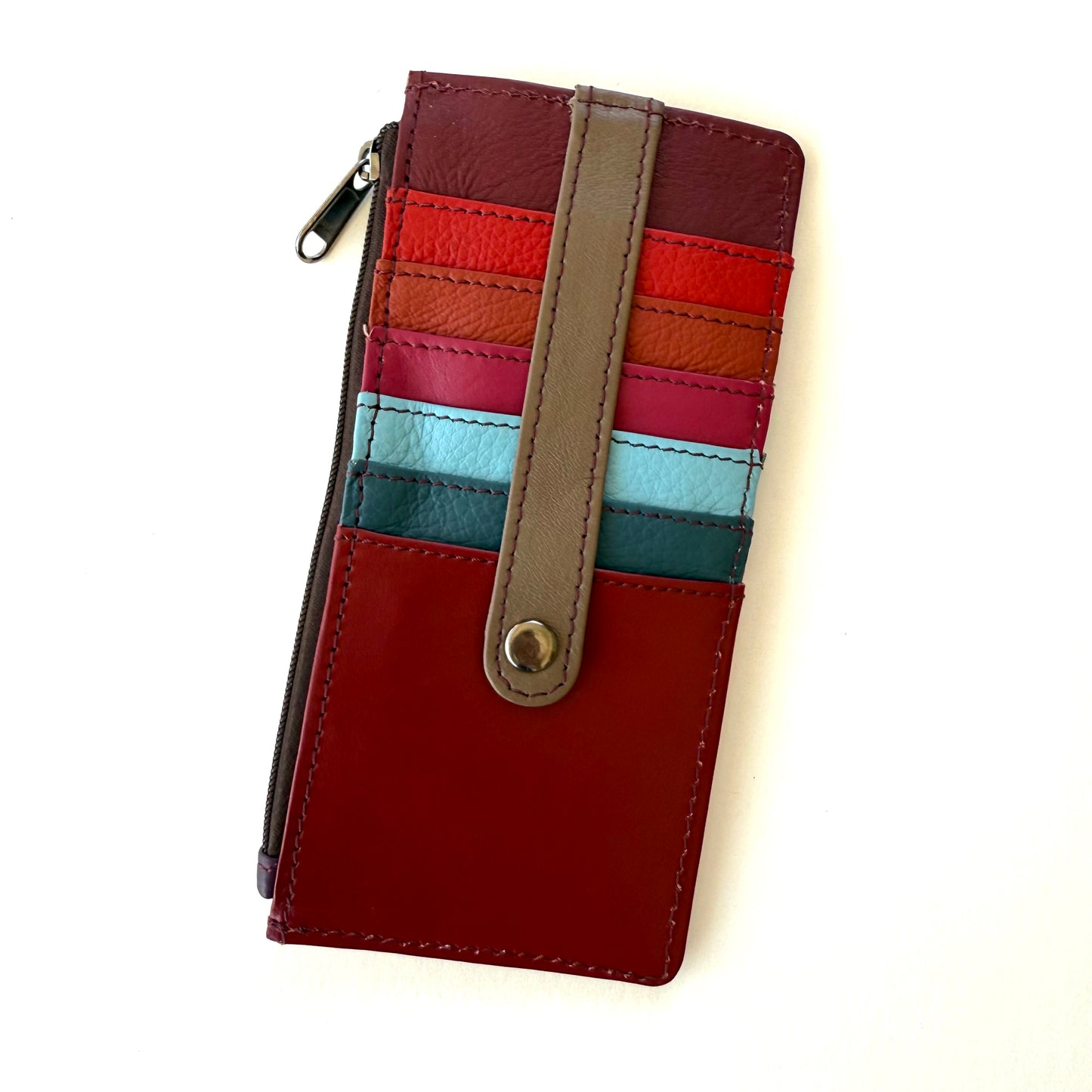 back view of colorful wallet with more card slots and strap