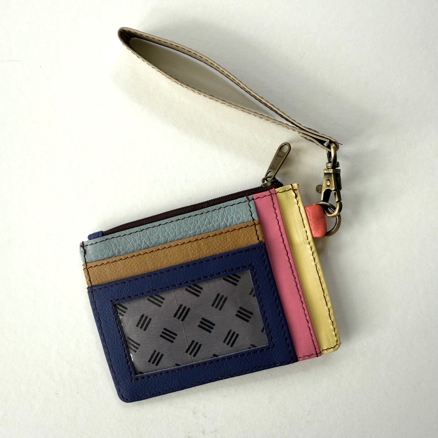 other side of wallet with colorful card slots and clear ID pocket