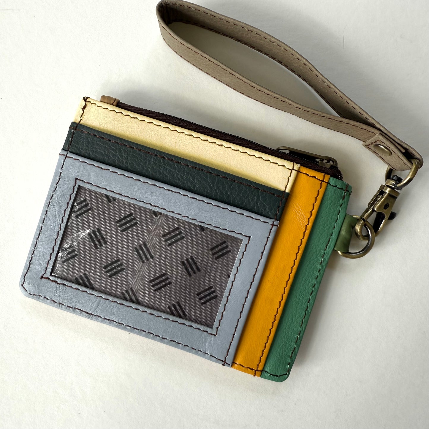 other side of wallet with colorful card slots and clear ID pocket