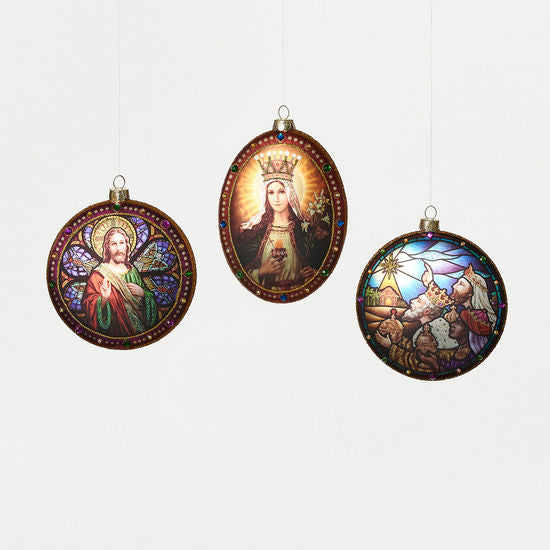 three glass medallion ornaments with religious-themed imagery