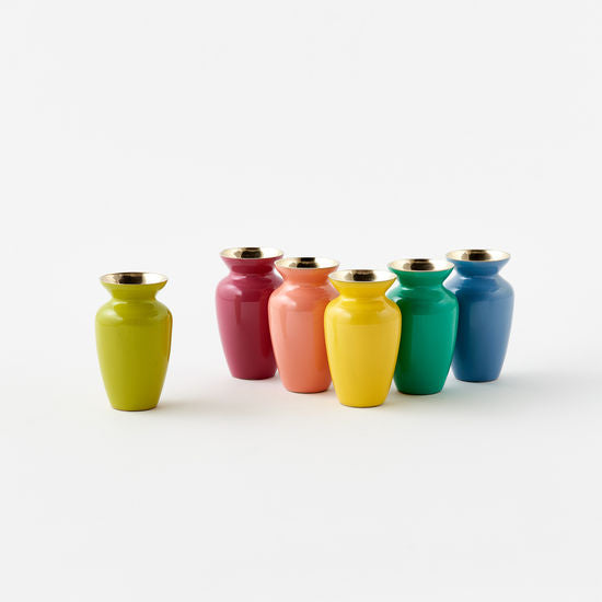6 Colorful Brass Vases arranged on a white surface