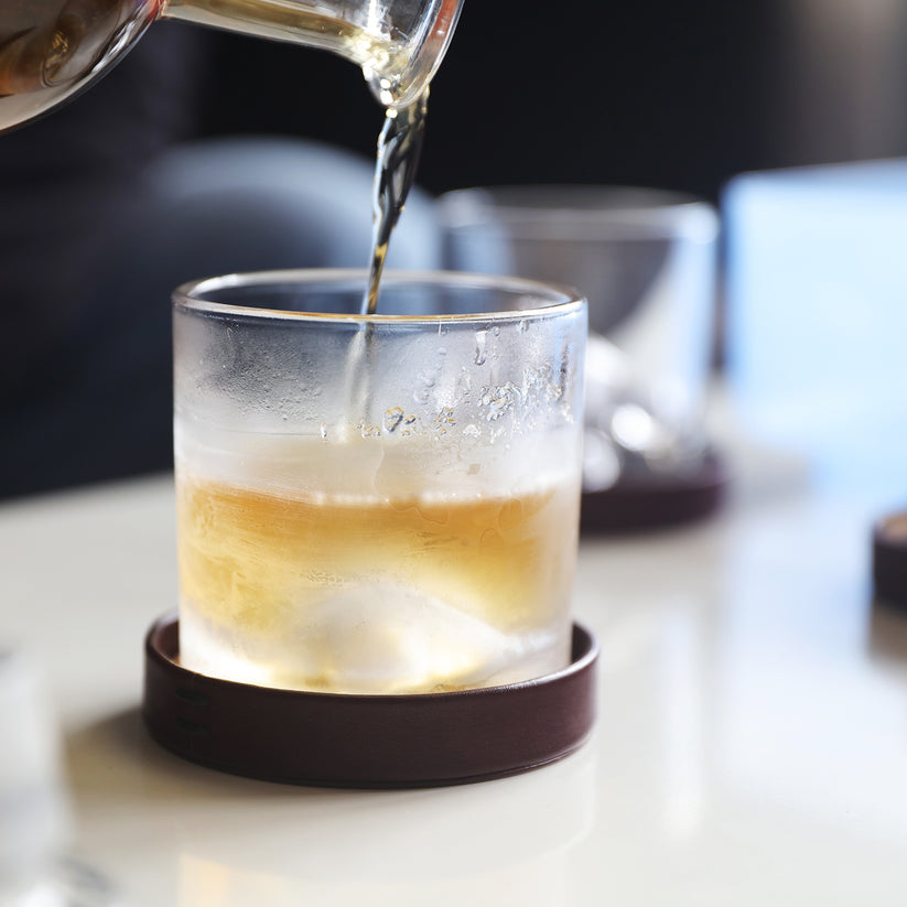 whiskey being poured into a chilled  Everest Crystal Whiskey Glass.