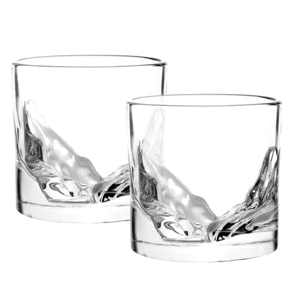 empty Grand Canyon Crystal Whiskey Glasses on a white background.