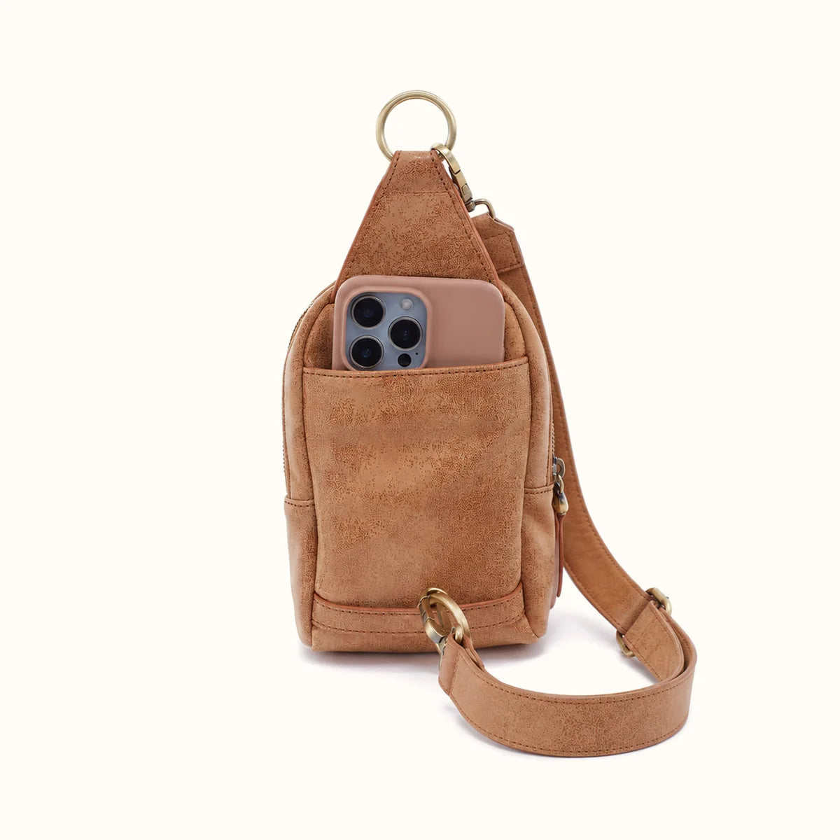 back view of the fern small sling in whiskey