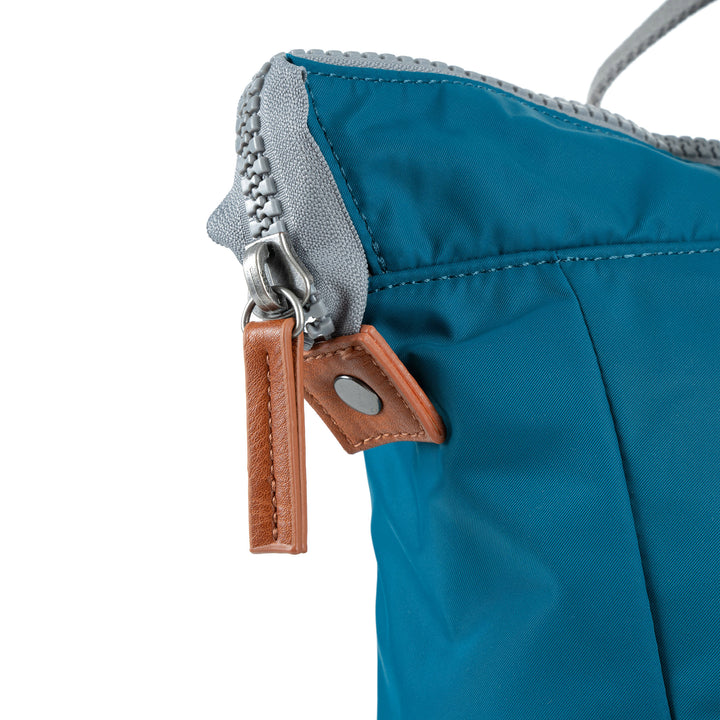 close-up of top zipper pull.