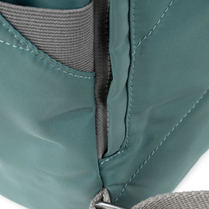 close-up of side pocket.