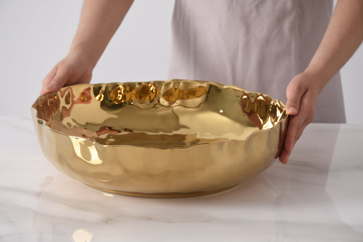 hands holding Portofino Large Shallow Bowl.