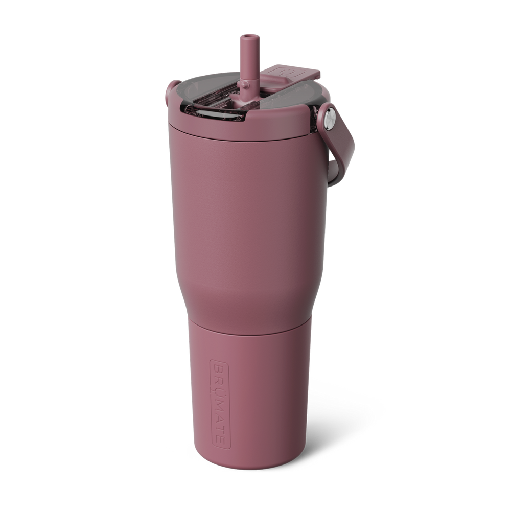 A dusty rose insulated travel tumbler with a matching lid and straw, featuring a carry loop shown on a plain white background.