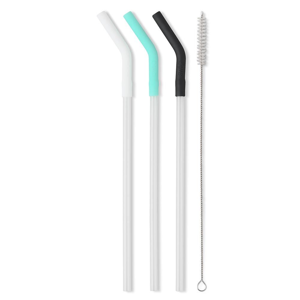 clear straws with silicone tips in white, aqua and black set next to a straw cleaning brush.