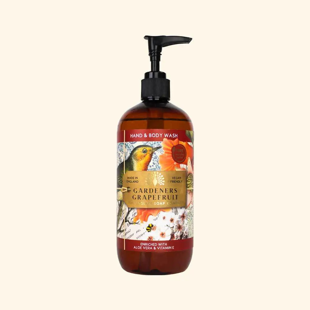 Hand and body wash bottle with a decorative label featuring a bird and flowers on a white background.
