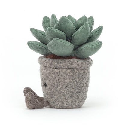 side view of plush succulent in a plush pot with legs and smile face on white background