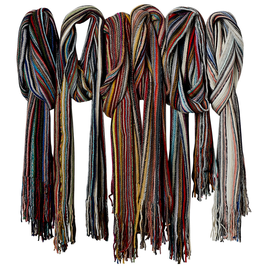 row of Cheerful Multi-Color Fringe Scarfs draped on a white background