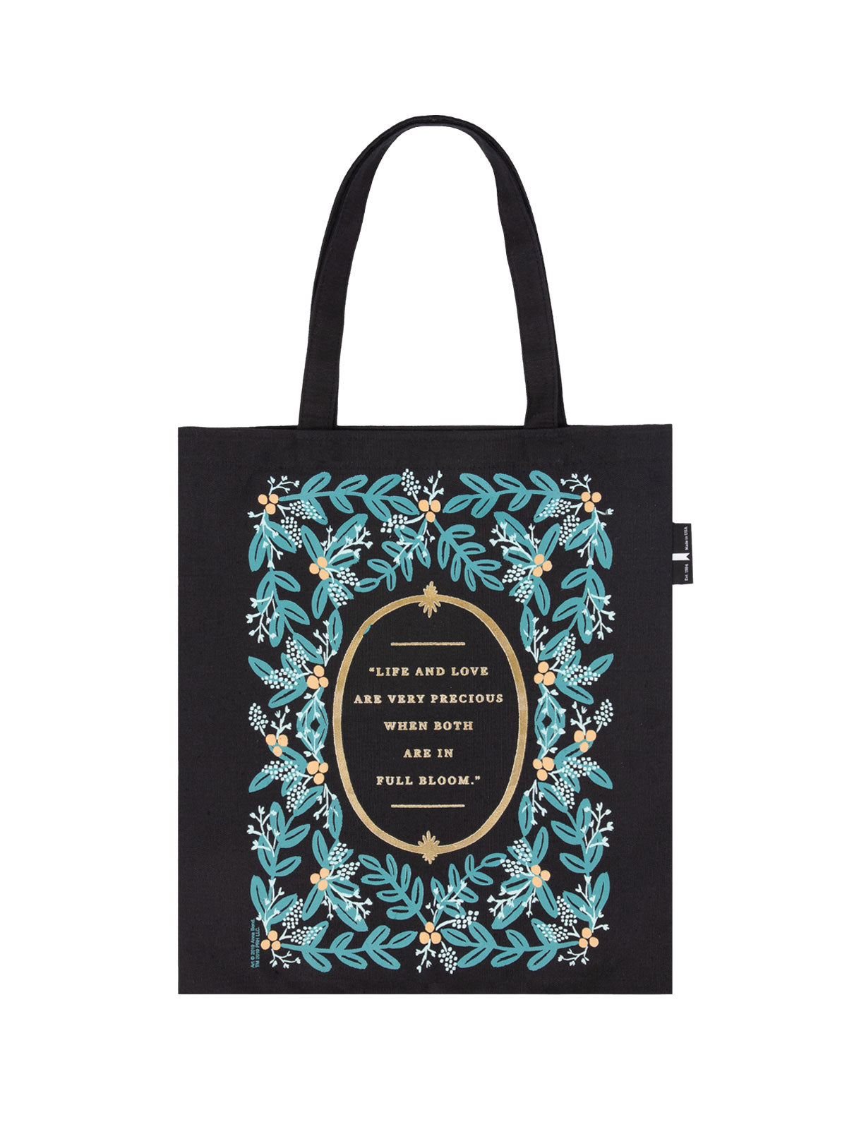 black tote with green stems and gold text "life and love are very precious when both are in full bloom"