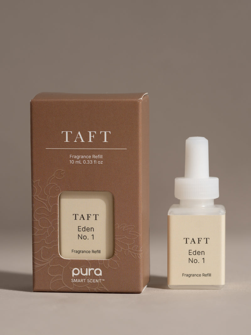 Pura Scents Eden No. 1 smart vial by TAFT set next to its box packaging.