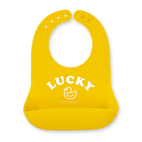 Yellow bib with 'LUCKY' and a duck illustration on a white background