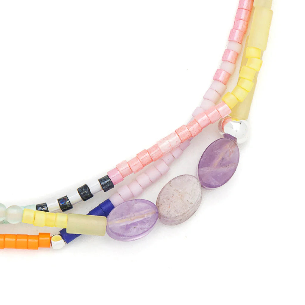 close-up of beaded bracelet on a white background