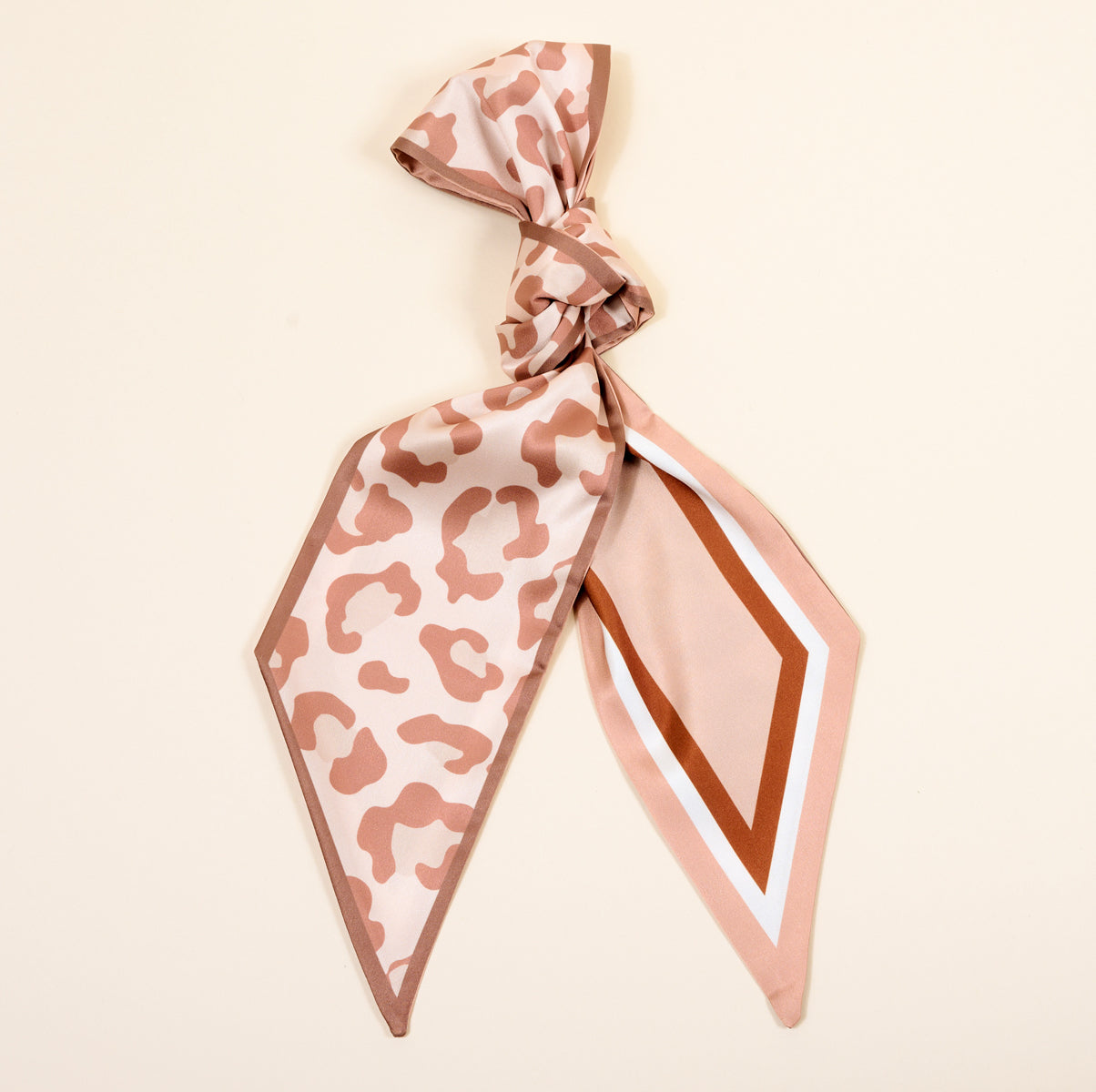 Born Wild Twirl & Tie Scarf on a beige background