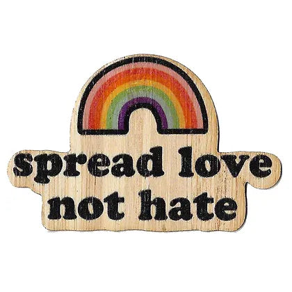 cartoon style rainbow with text underneath saying "spread love not hate" in black lettering