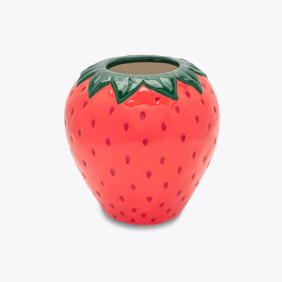 strawberry shaped vase shown on a white background