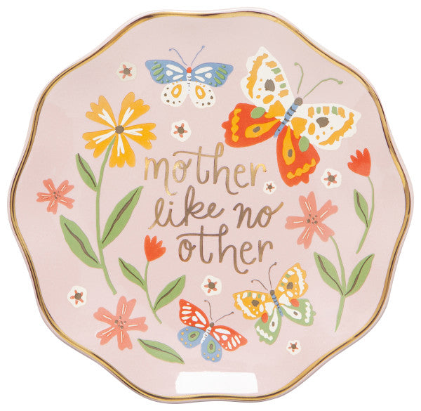 small pink plate with florals, butterflyies, and "mother like no other" printed on it.