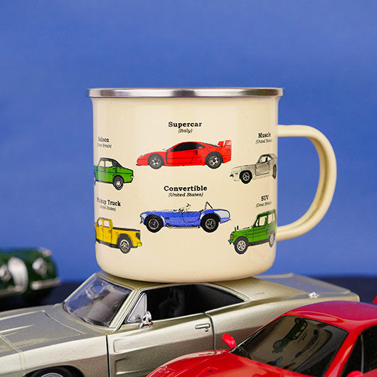 car enameled mug set on a toy car.