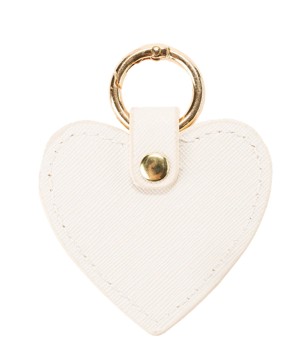 heart shaped J’Adore White Bag Charm with gold o-ring