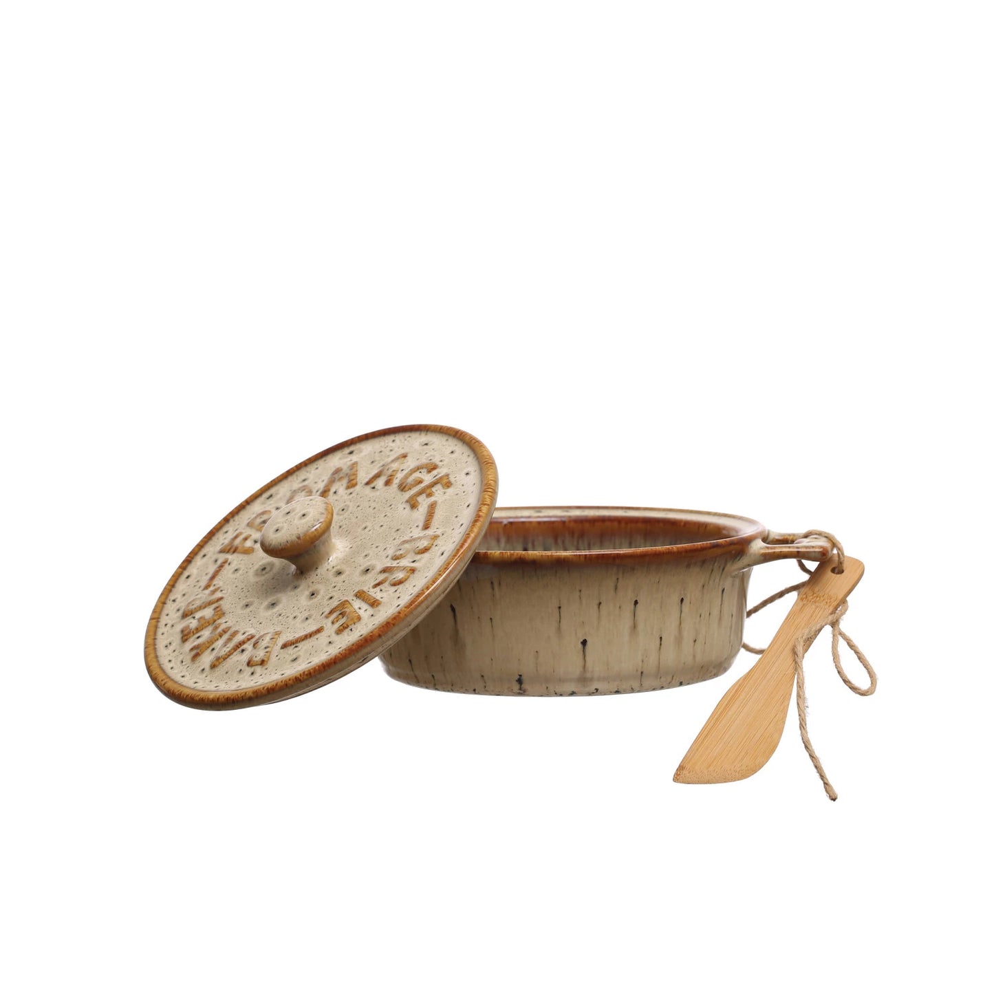 brie baker with lid set askew on it.