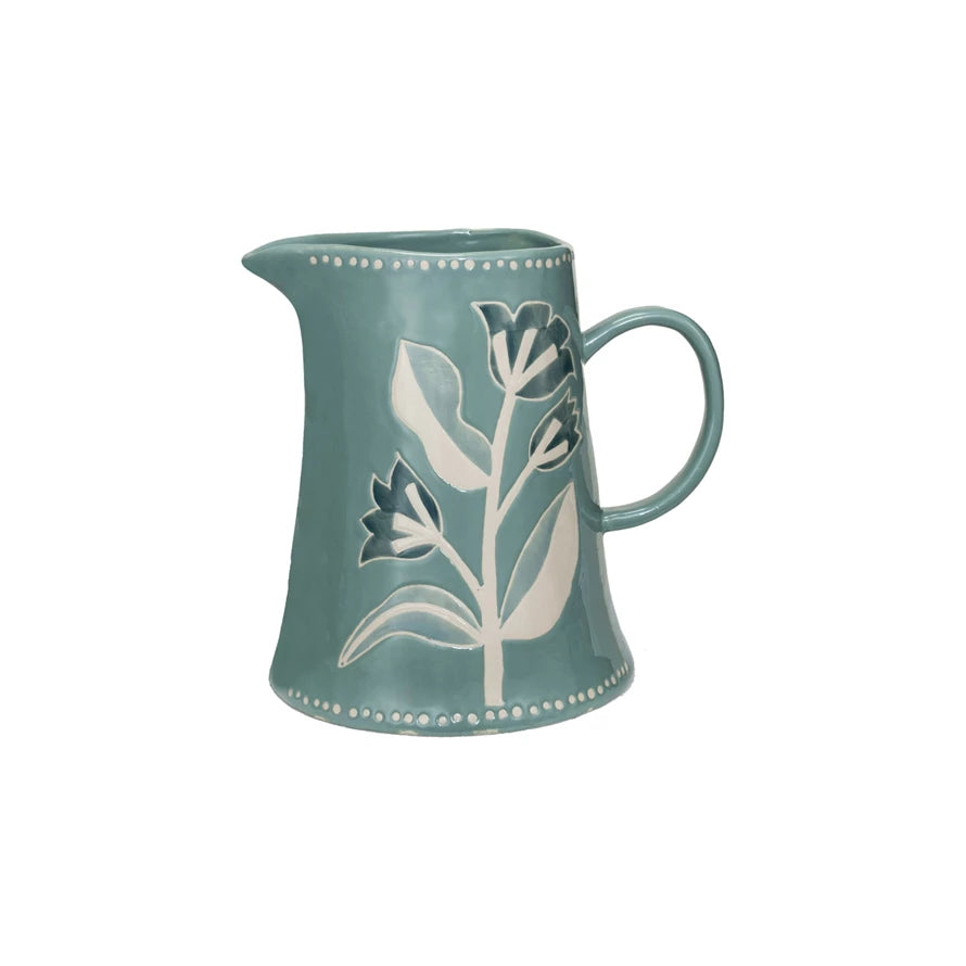 blue pitcher with a floral pattern.