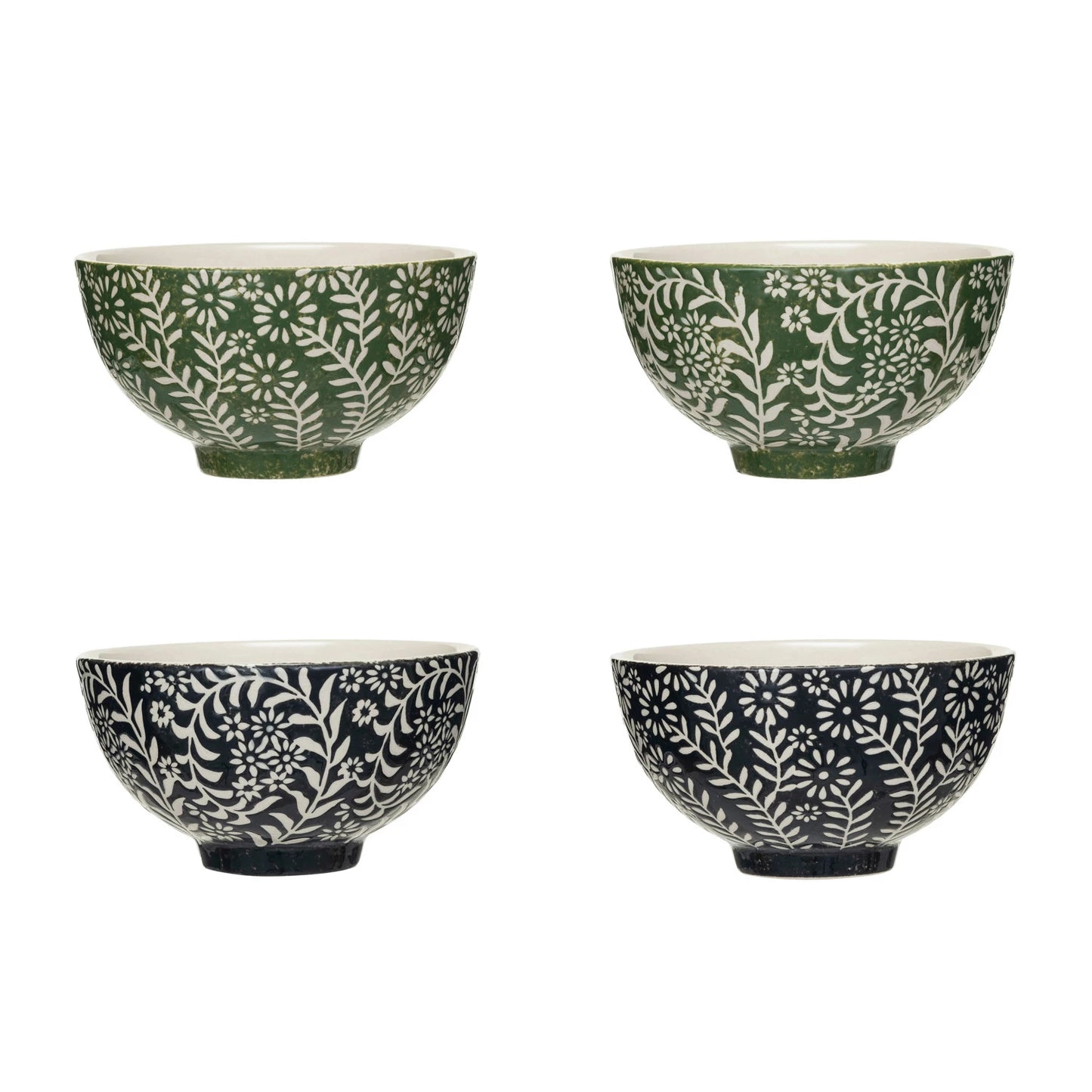 2 green and 2 black stoneware bowls with botanical designs.