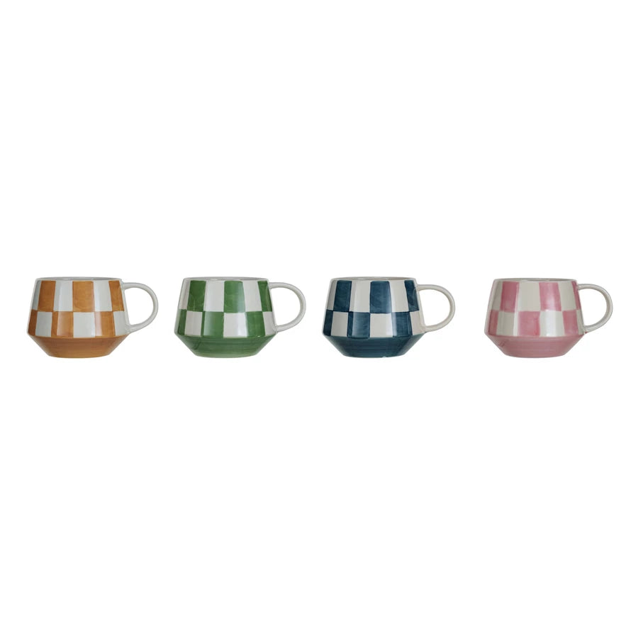 4 colors of checked mugs in a row on a white background.