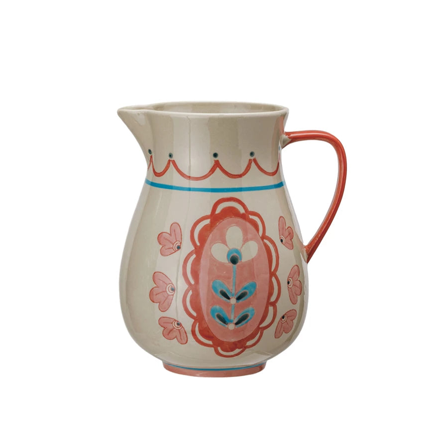 pink floral pitcher shown on a white background.