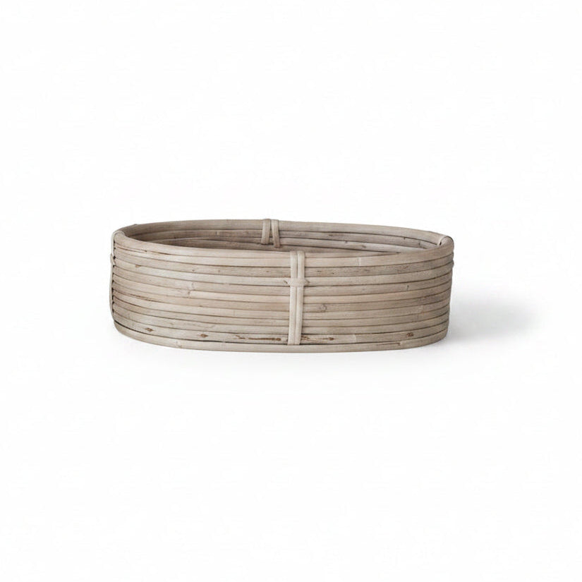 large oval basket shown on a white background