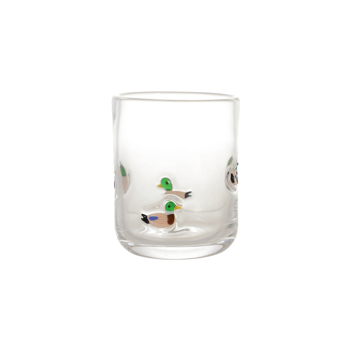 A clear glass tumbler featuring embedded glass mallard ducks near the base, set against a plain white background.