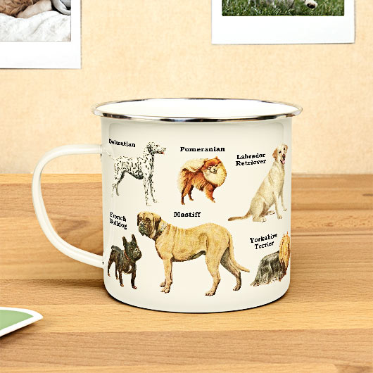 enameled dog mug set on a desk.