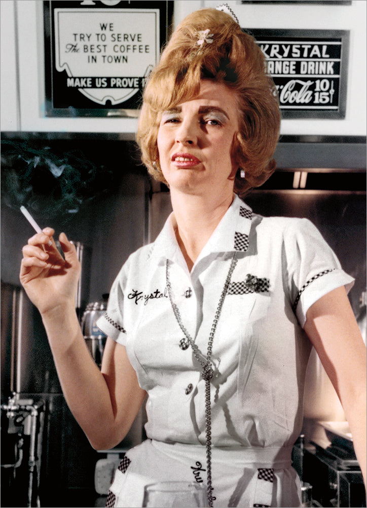 front of card is a woman holding a smoke in a diner