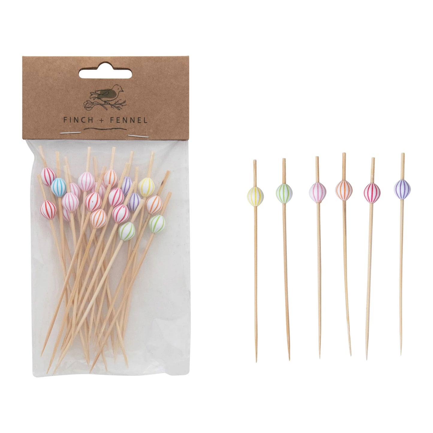 Packaged wooden skewers with colorful beads on the ends on a white background