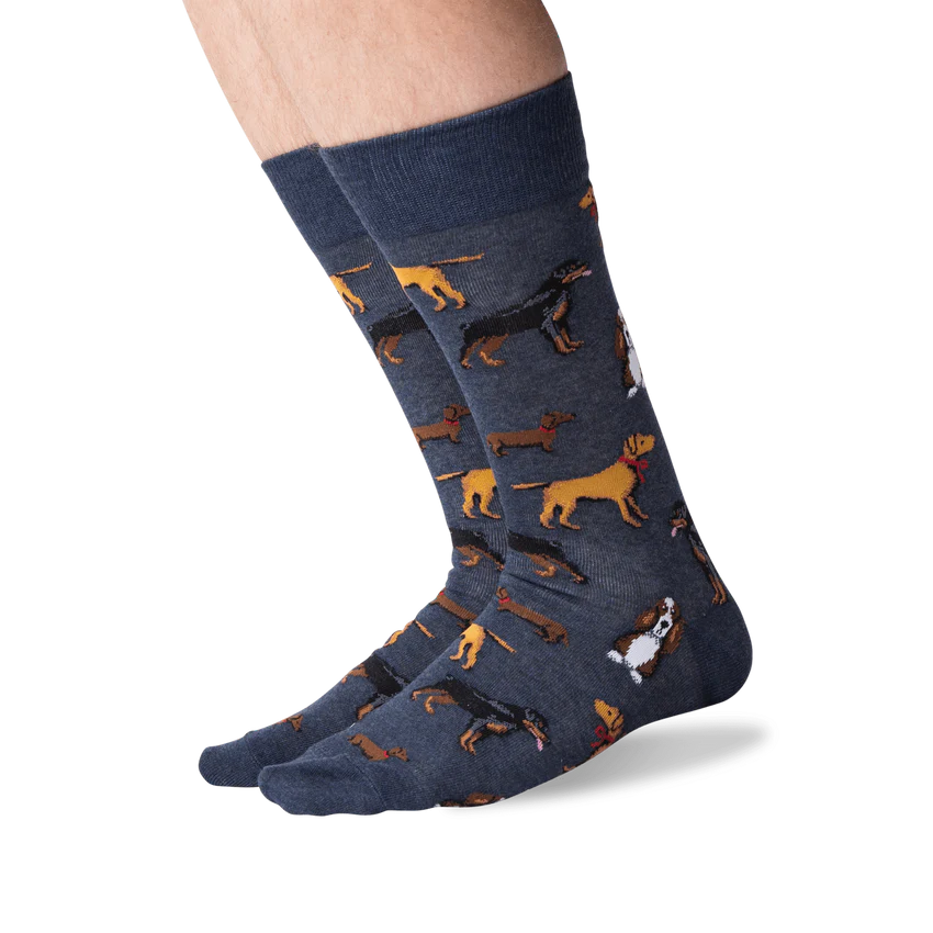 feet wearing denim blue multi dog socks.