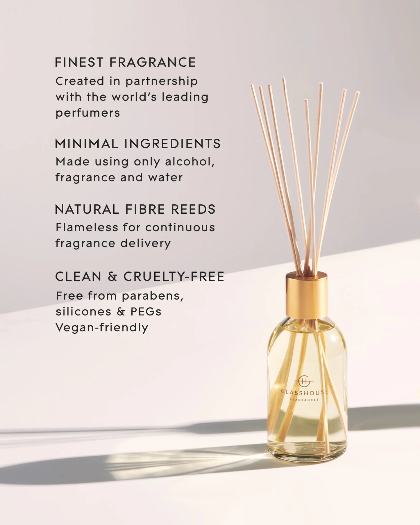 Diffuser with reeds and text about its features on a light background