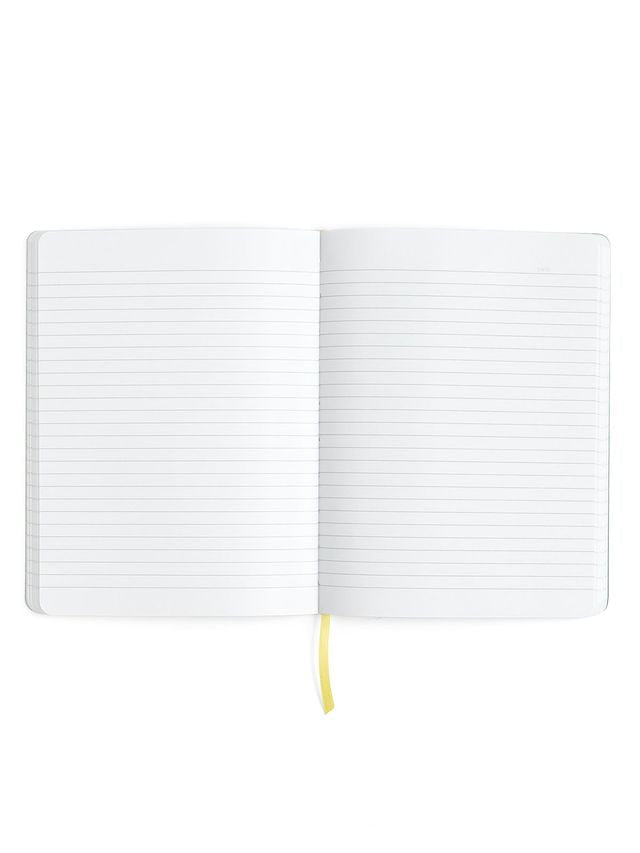 Open notebook with lined pages on a white background