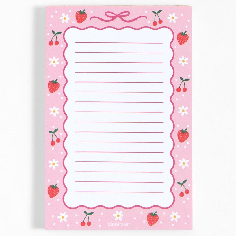 berries and bows notepad on a white background