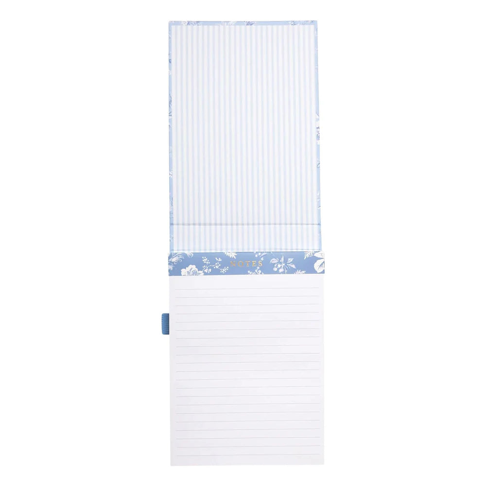 open flip notebook showing lined pages inside