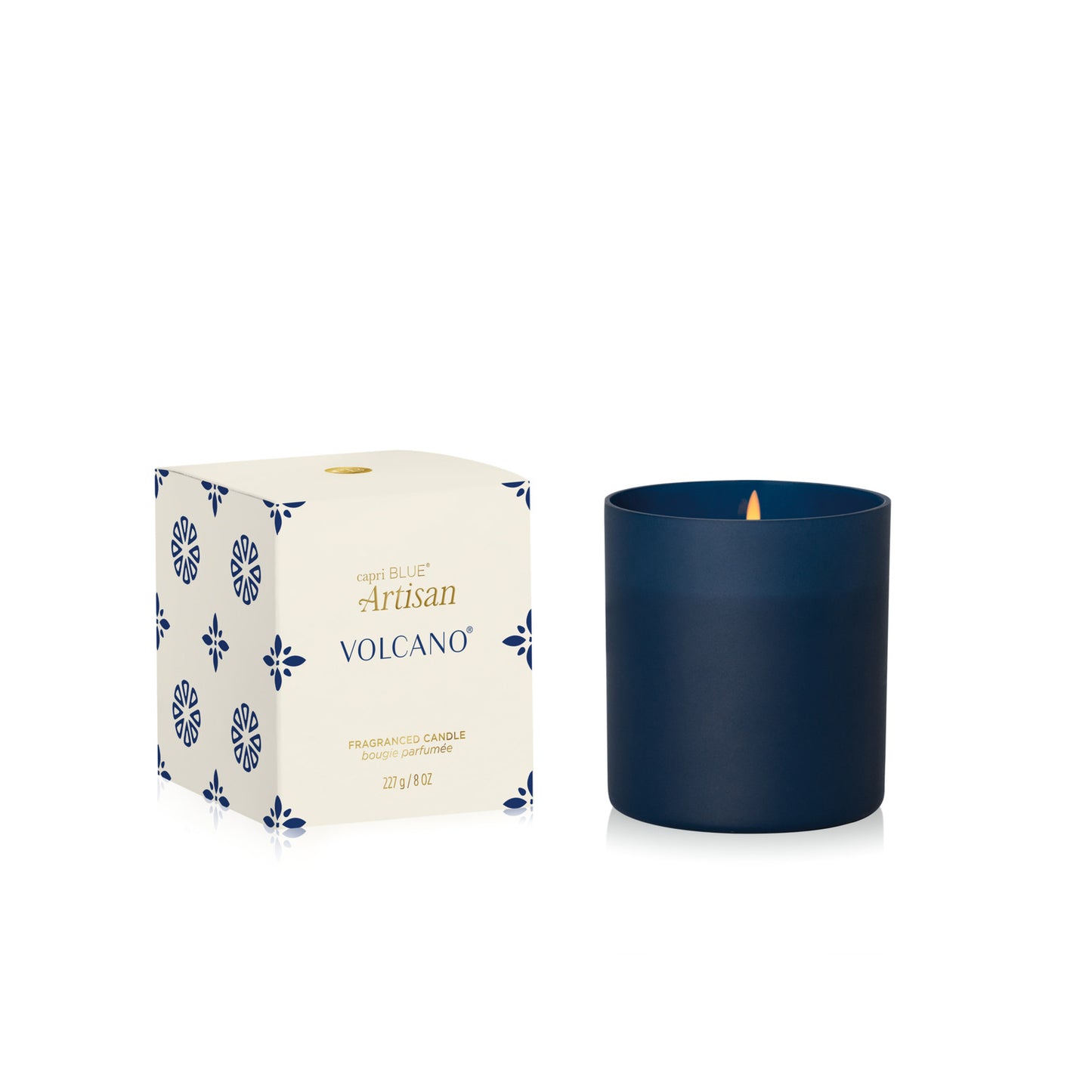 Volcano Artisan Terrazza Velluto Tumbler Candle next to its box on a white background