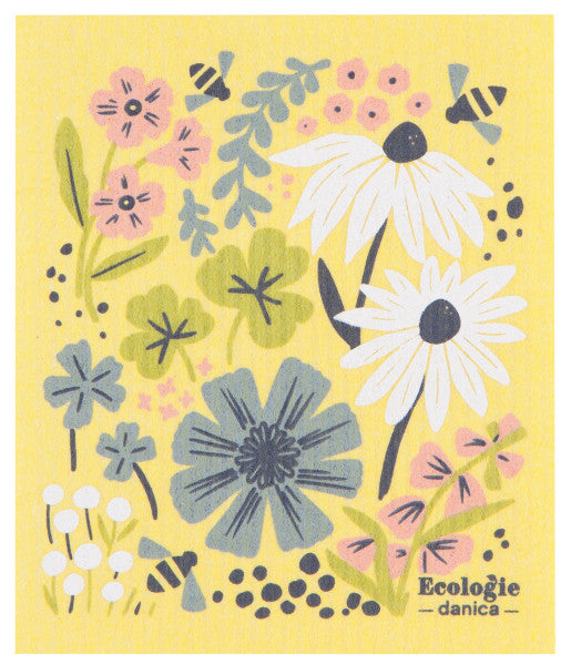 yellow dishcloth with floral design printed on it