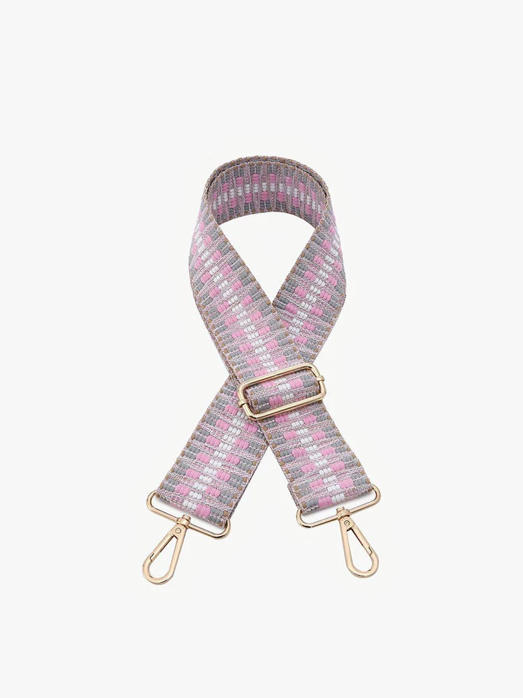 pink and grey guitar strap.