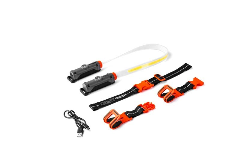 bando work light arranged on a white surface with its attachments.