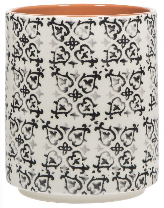 terracotta with black and grey design on the outside displayed against a white background