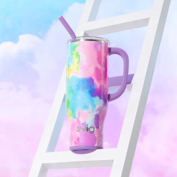 pastel watercolor printed swig mega mug set on a white ladder with sky in the background.