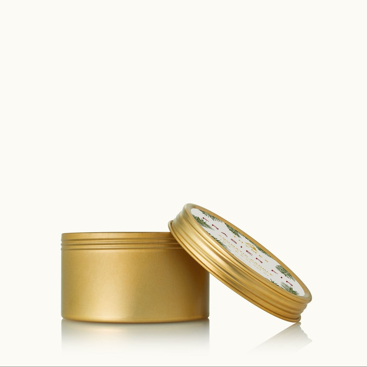 frasier fir candle in travel tin on a white background